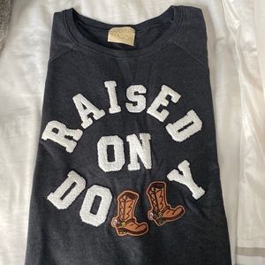 Judith March raised on dolly shirt